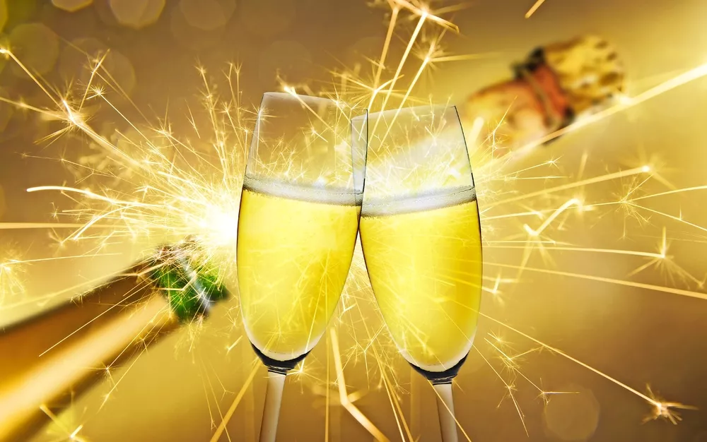 Feuerwerk mit Sekt