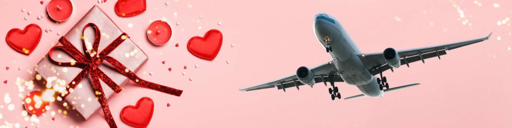 Banner Valentinstag Ein Geschenk mit Valentinstags Dekoration und ein Flugzeug.